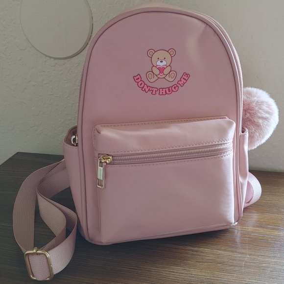 Pink "Don't Hug Me" Mini Backpack with Fluffy Ball Decoration - Picture 1 of 5